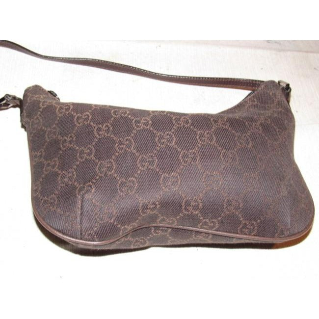 Gucci, petite, brown Guccissima print canvas & brown leather, hobo style, kidney shaped purse with chrome hardware & zip top closure