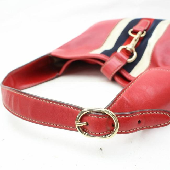 Vintage, Gucci, new Jackie style, red leather with a red, white, & blue center Sherry stripe, triangular shape, & gold hook closure