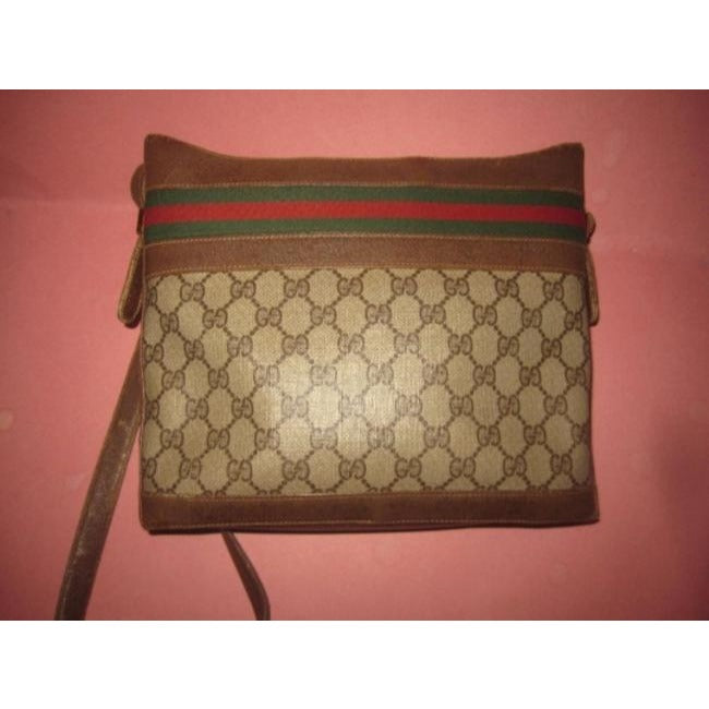 Gucci brown Guccissima print bucket bag w red & green stripe