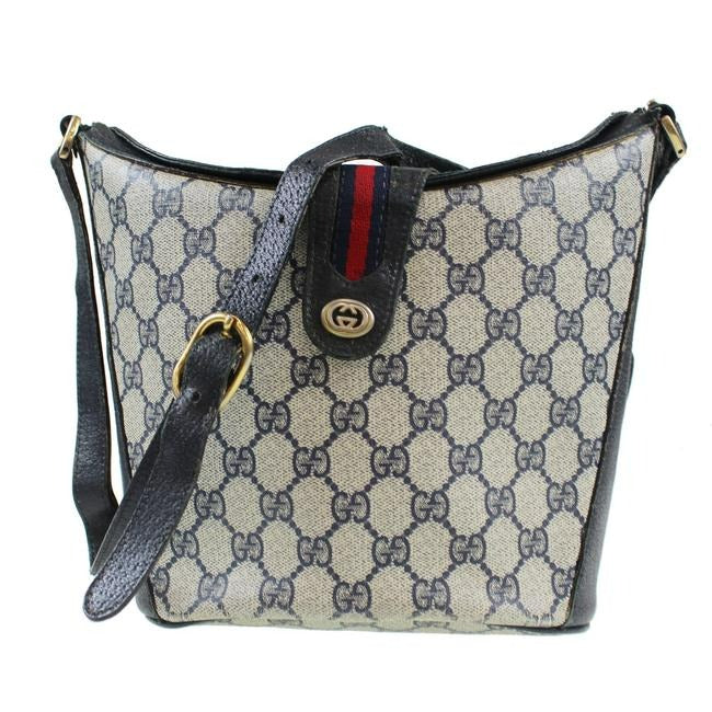 RARE, Gucci, navy blue Guccissima print leather, bucket bag w red & navy striped, top strap & gold GG logo accent