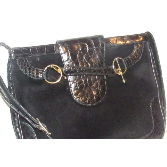 RARE, Gucci, 'snaffle' style, bohemian/mod, black suede and crocodile leather, hobo style shoulder purse with a wide, crocodile embossed leather flap snap closure and gold tone equestrian accents