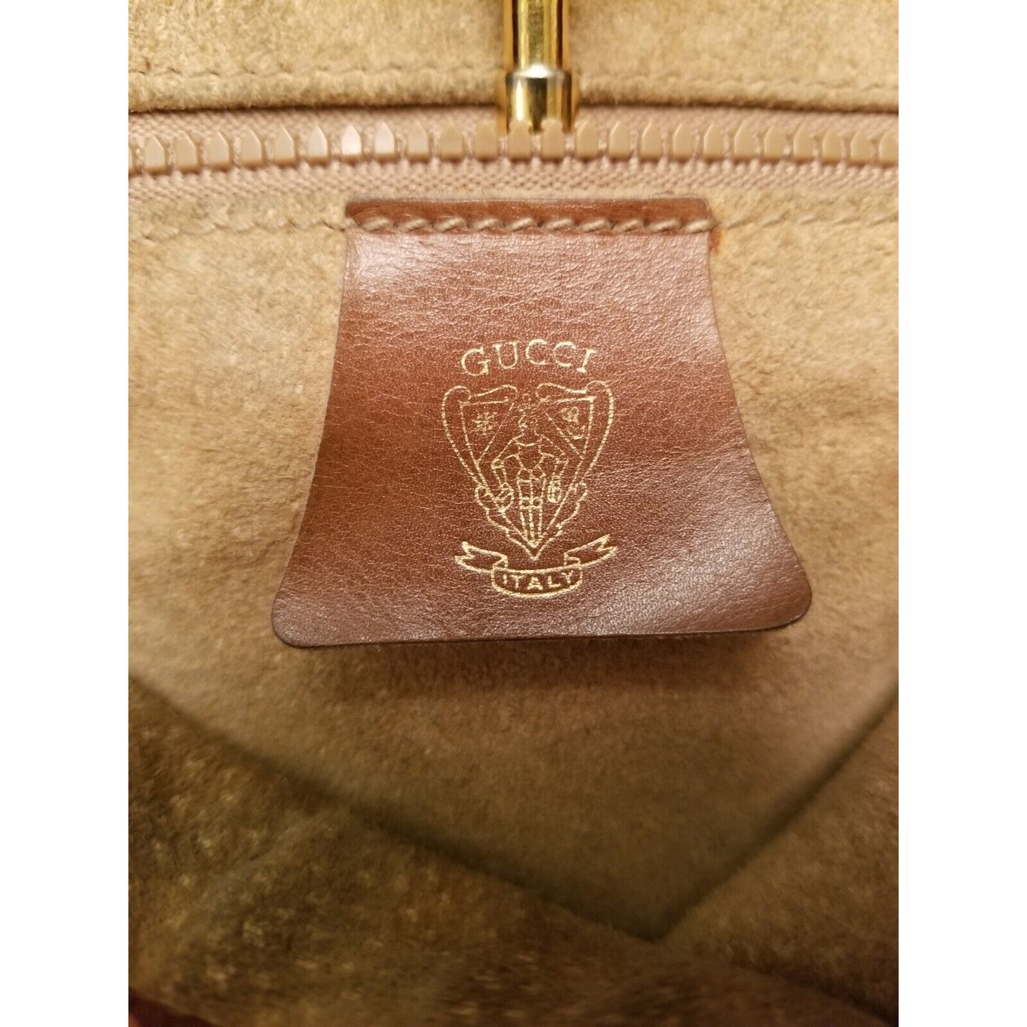 Rare, vintage, Gucci, camel leather 1961 Jackie hobo shoulder bag with a red & green center stripe, gold piston closure, & extender strap