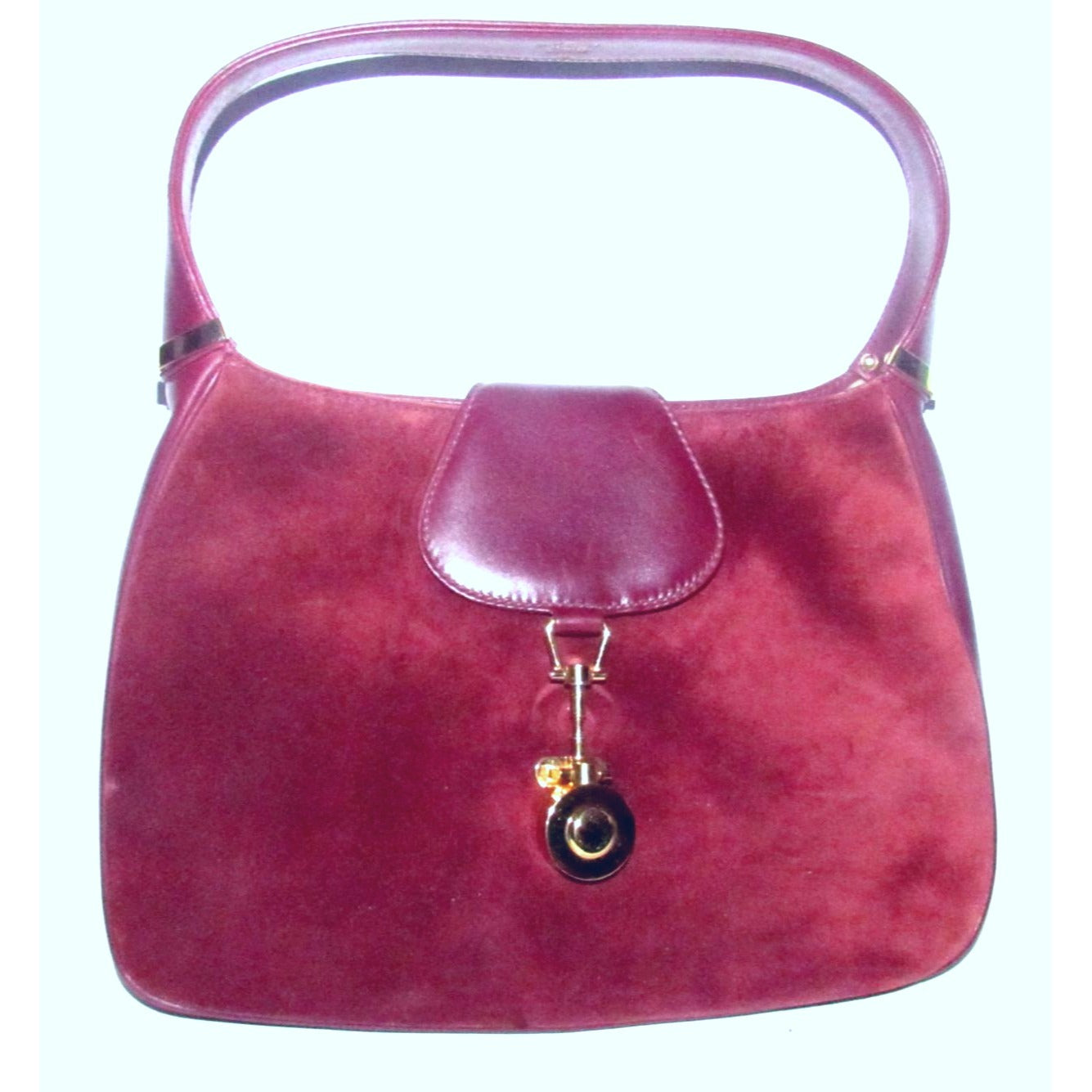 Rare, vintage, Gucci, burgundy leather & suede, unique, 1961 Jackie, hobo style shoulder bag with a two-tone piston closure & flap top