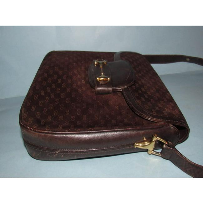 RARE, Gucci, mod, 1955 Horse-bit, dark brown micro Guccissima print embossed suede and leather shoulder bag with an envelope top, two strap lengths, and bold gold horse bit accents