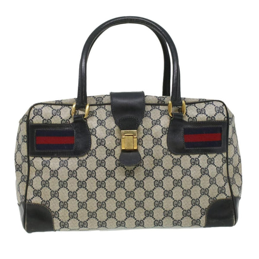 Very unusual, Gucci, blue Guccissima print & navy leather with wide red and blue striped corners, a footed bottom, dual zip closure top