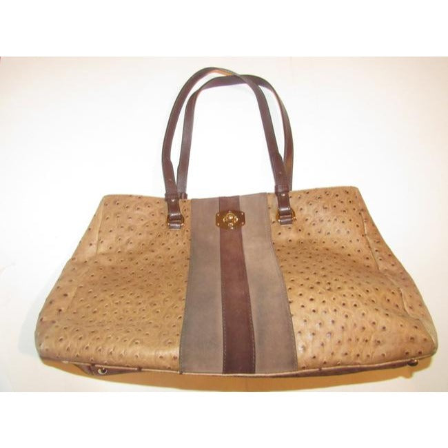 Furla, two handle, tote bag made of a fabulous, brown ostrich embossed leather and suede striped center in shades of burgundy