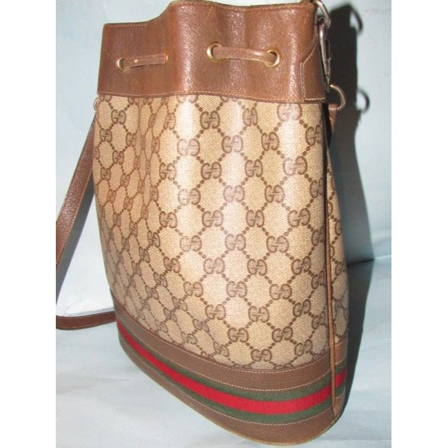 Gucci brown Guccissima print coated canvas & brown leather drawstring top Bucket Bag w red & green striped bottom