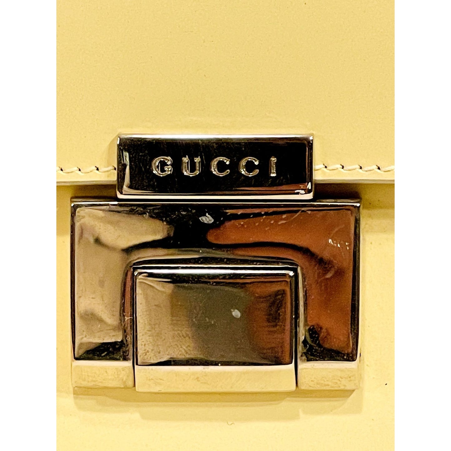 RARE, Gucci, pearly ivory/pale yellow smooth leather, Tom Ford era Padlock, two-way style with chrome hardware & removable strap