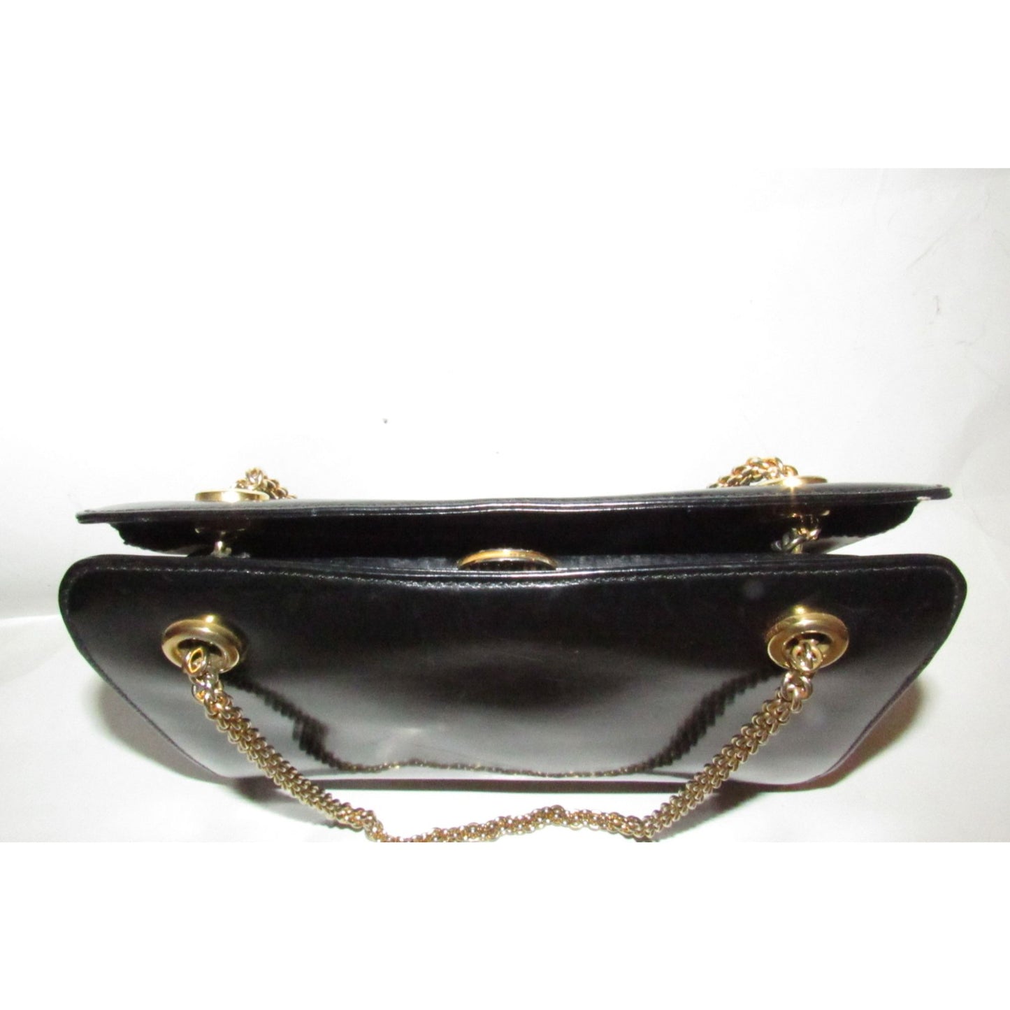 Rare 60s, mod, Giorgio Gucci, black leather, satchel style shoulder bag with a snap hinged top, two heavy gold chain shoulder straps