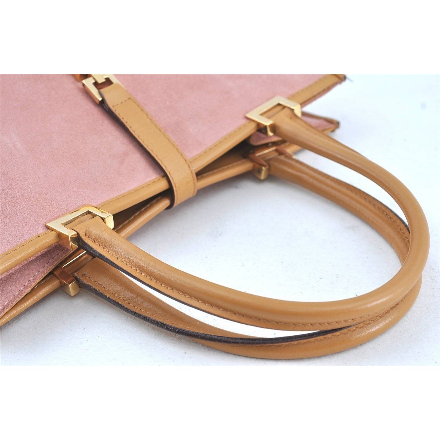 Gucci, pink suede and camel leather, Jackie bag with two, rolled leather handles, a chrome, push button closure and flip top closure