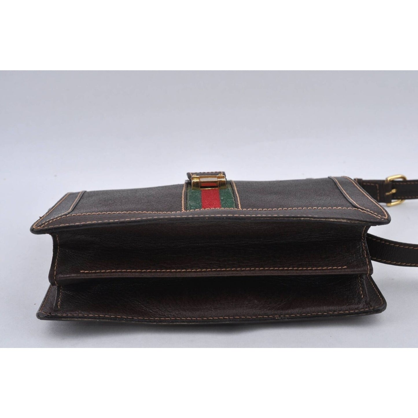 Vintage Gucci brown leather, boxy, cross body or shoulder purse with bold gold tone w a red & green stripe