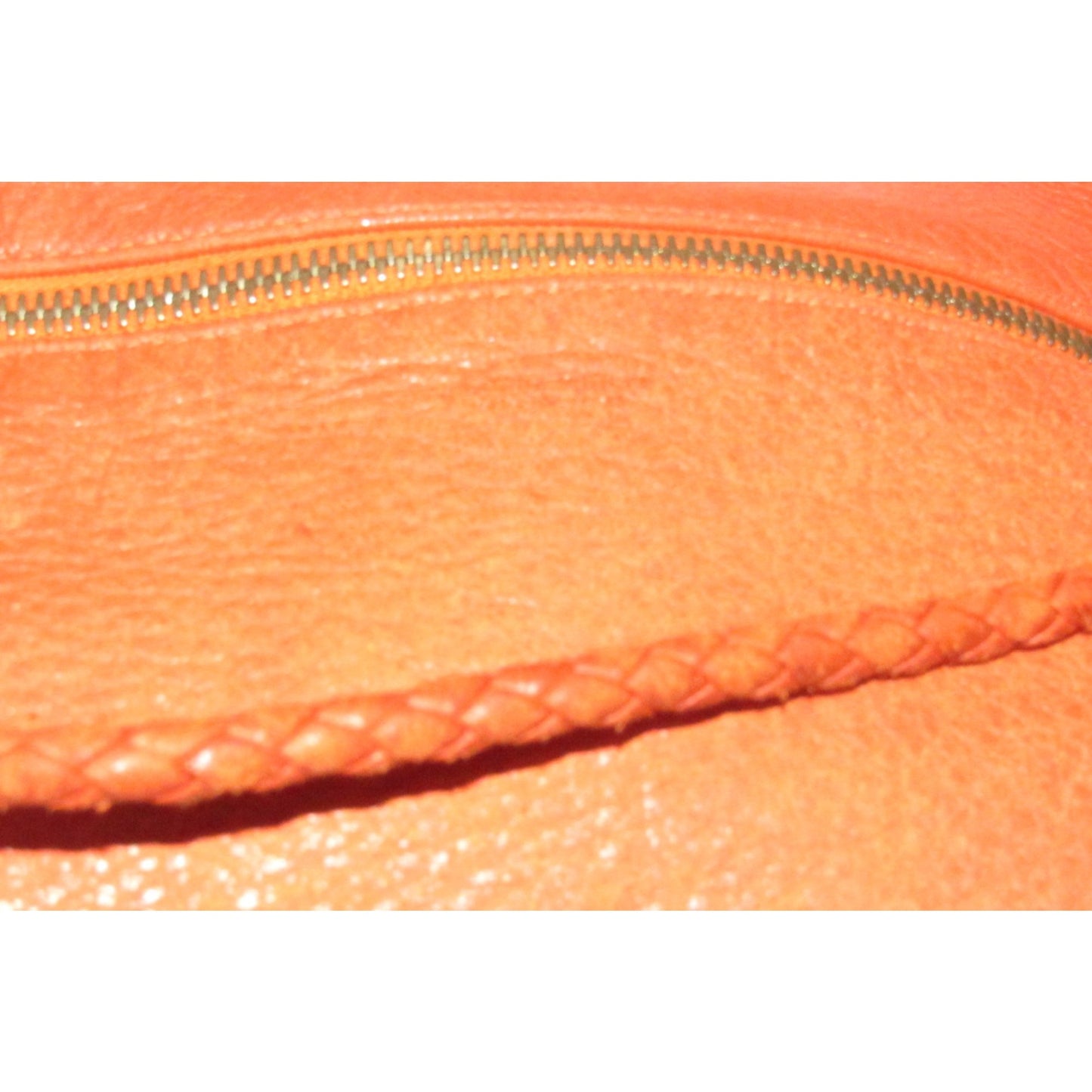 High- end bohemian, RARE, Bottega Veneta, orange leather with a braided leather strap and trim, satchel style, bucket purse