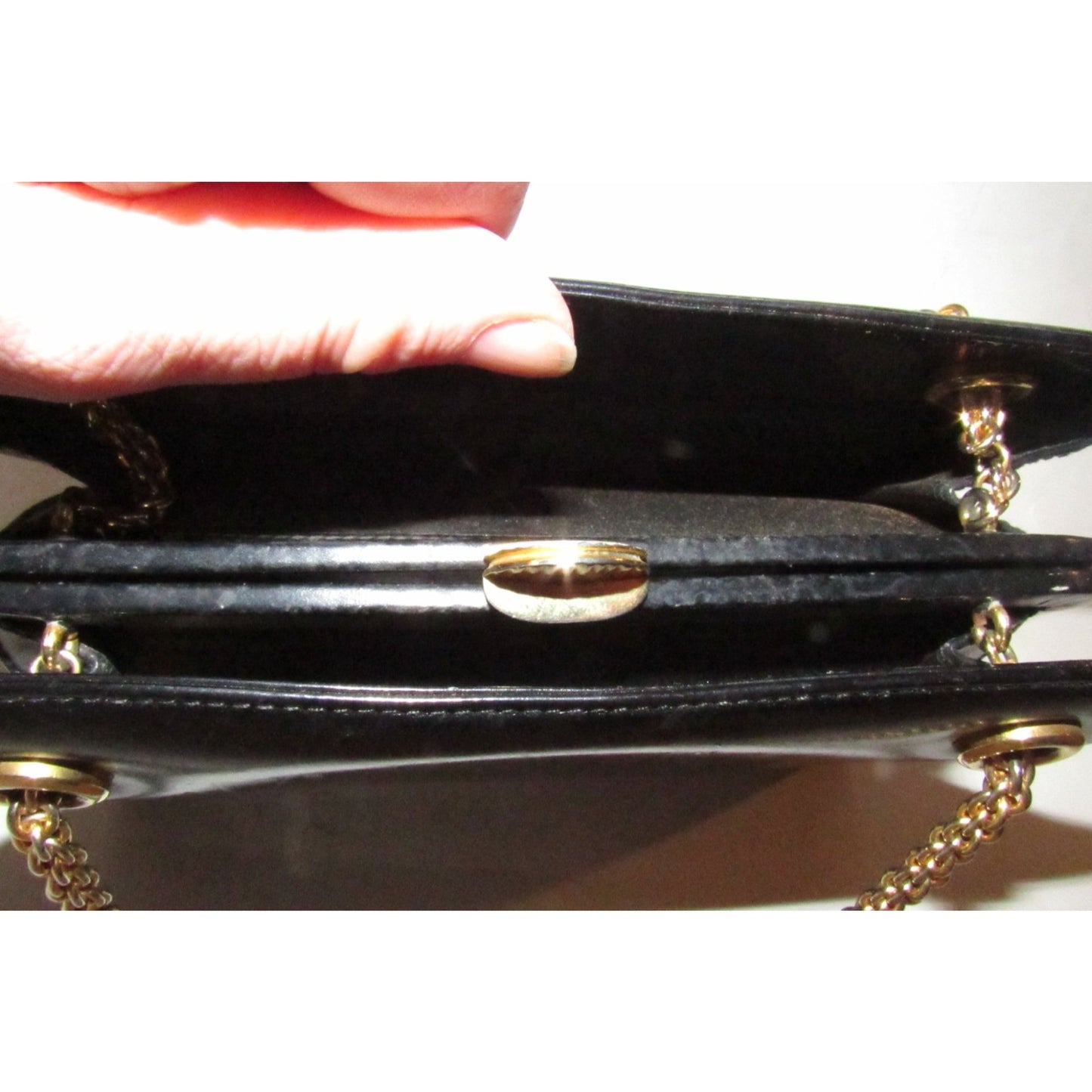 Rare 60s, mod, Giorgio Gucci, black leather, satchel style shoulder bag with a snap hinged top, two heavy gold chain shoulder straps