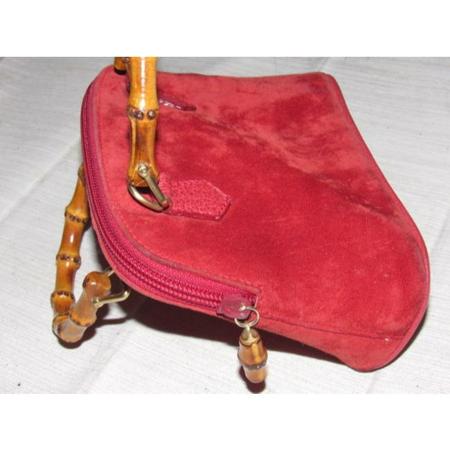 Gucci red suede & leather two-way style, purse with a detachable strap, bamboo handles, and gold equestrian accents!