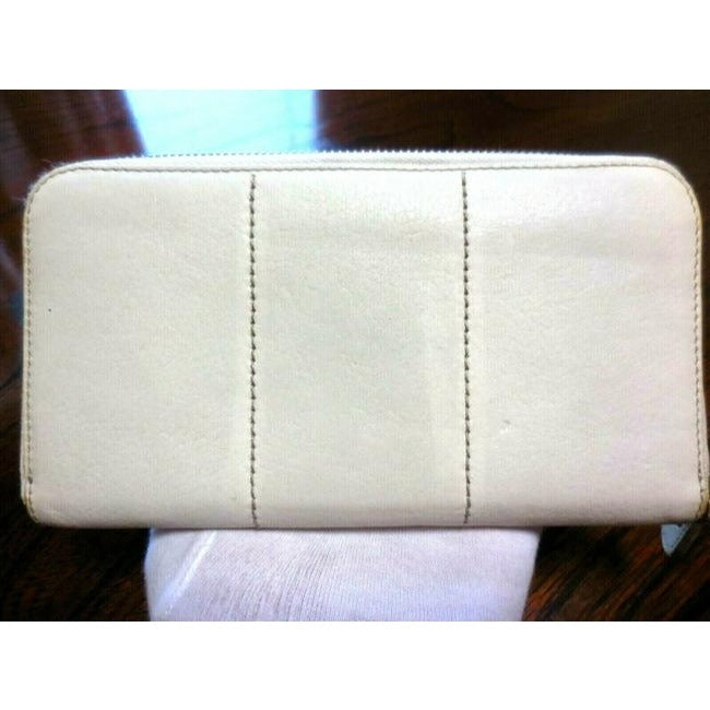 Salvatore Ferragamo White Leather With Brown Contrast Stitching And A Quilted Double Gancini Zip Around Wallet