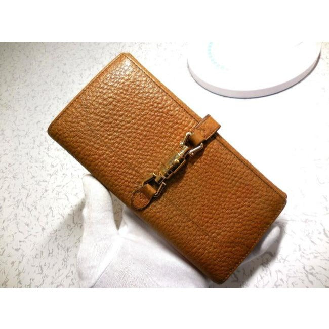 Gucci Camel Textured Leather Jackie Style Checkbook Size Wallet With A Gold Piston Closure