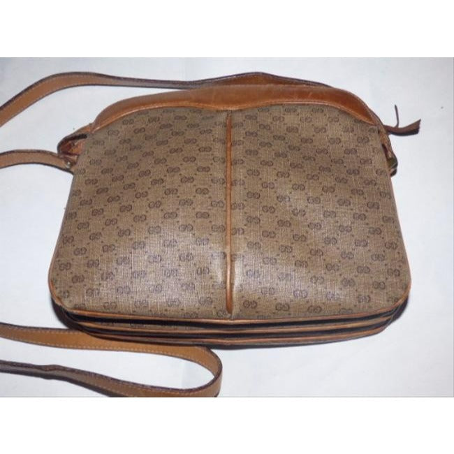 Gucci, brown micro Guccissima print coated canvas and camel leather cross body or shoulder bag with a zip top closure