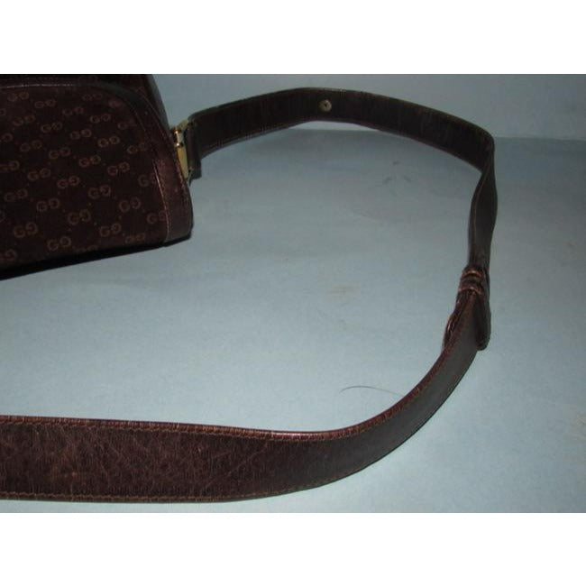 RARE, Gucci, mod, 1955 Horse-bit, dark brown micro Guccissima print embossed suede and leather shoulder bag with an envelope top, two strap lengths, and bold gold horse bit accents