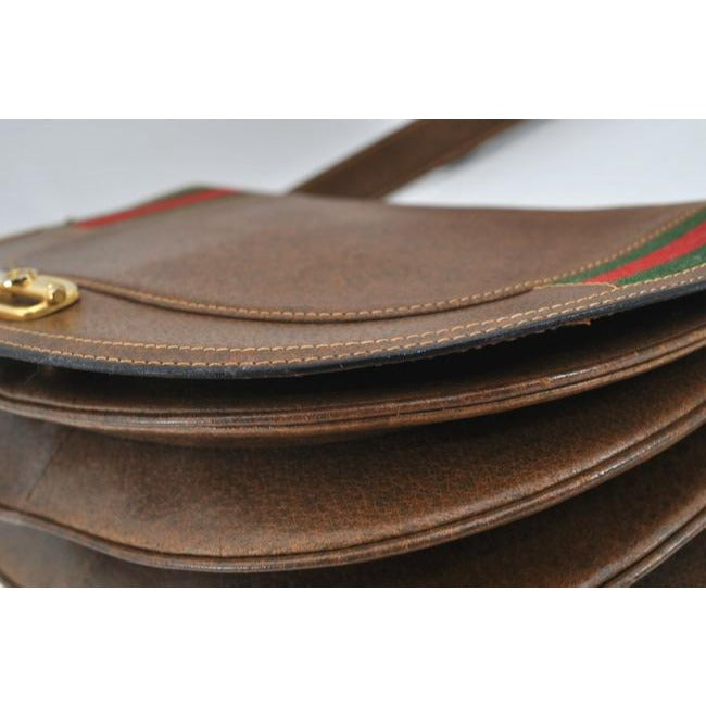 Early Gucci, brown leather saddle bag style, XL two-way shoulder bag or clutch with red and green striped edges