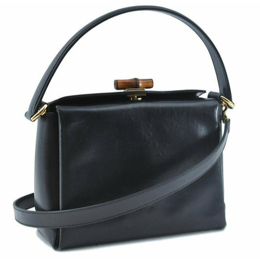 Tom Ford era, Gucci, midnight blue leather, roomy, Bamboo line, two-way top-handle shoulder purse with a bamboo clasp, gold tone hardware, a snap top closure, and a removable strap