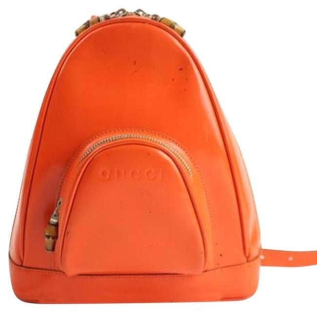 Tom Ford era, Gucci, petite, bright orange patent leather and smooth leather, triangular, messenger bag or backpack with a dual zip closure