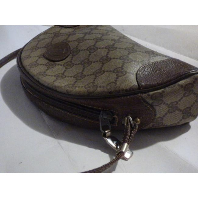 Gucci Vintage RARE, brown Guccissima print coated canvas and brown leather, top zip, hobo style, crescent shaped, shoulder bag with gold hardware