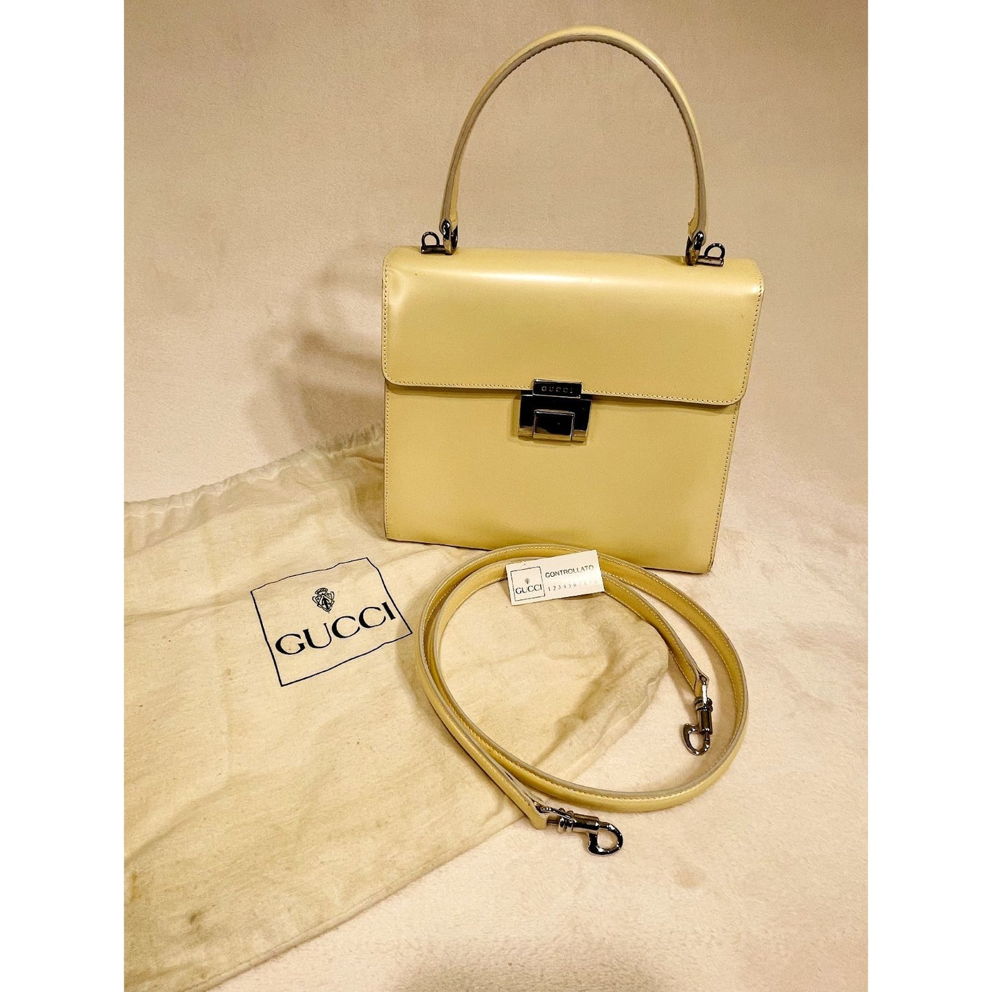 RARE, Gucci, pearly ivory/pale yellow smooth leather, Tom Ford era Padlock, two-way style with chrome hardware & removable strap