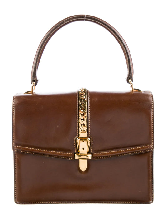 Gucci 1969 Sylvie chestnut brown leather top handle Kelly bag with a gold zipper accent