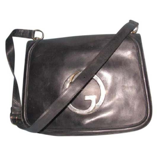 RARE, vintage, supple, black leather, Gucci 'Blondie' saddle bag style shoulder bag with an XL, gold 'GG' logo cut-out