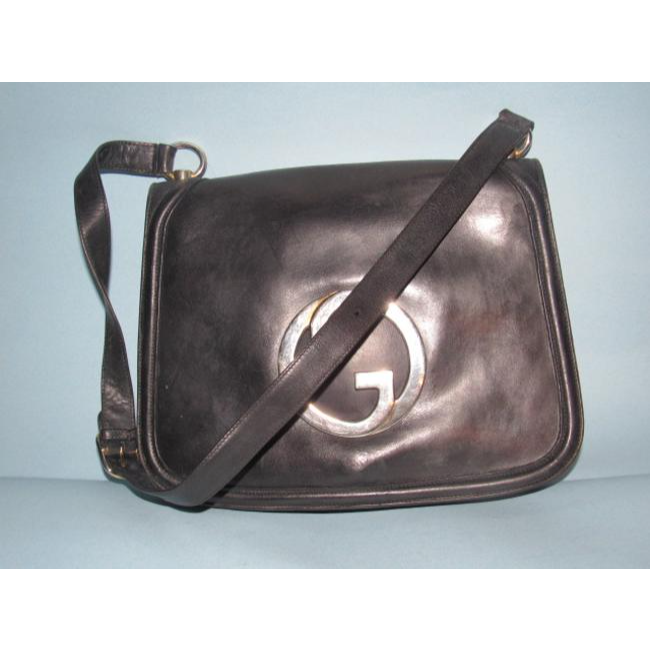 RARE, vintage, supple, black leather, Gucci 'Blondie' saddle bag style shoulder bag with an XL, gold 'GG' logo cut-out