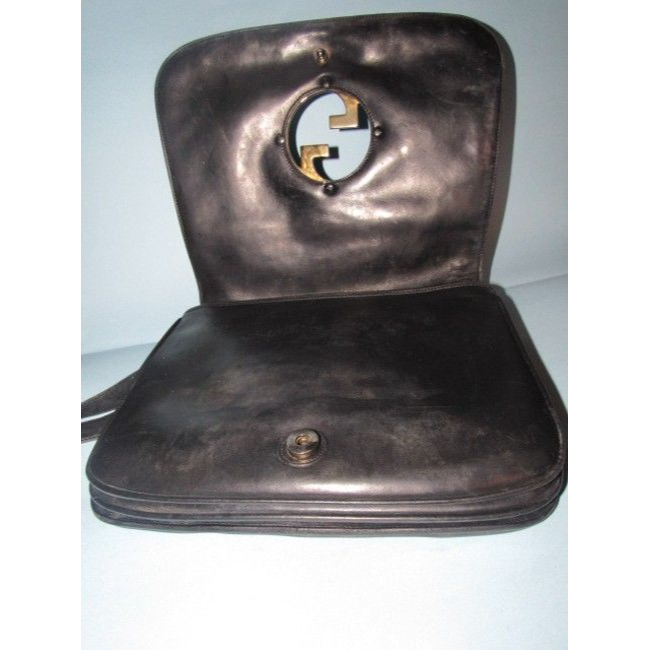 RARE, vintage, supple, black leather, Gucci 'Blondie' saddle bag style shoulder bag with an XL, gold 'GG' logo cut-out