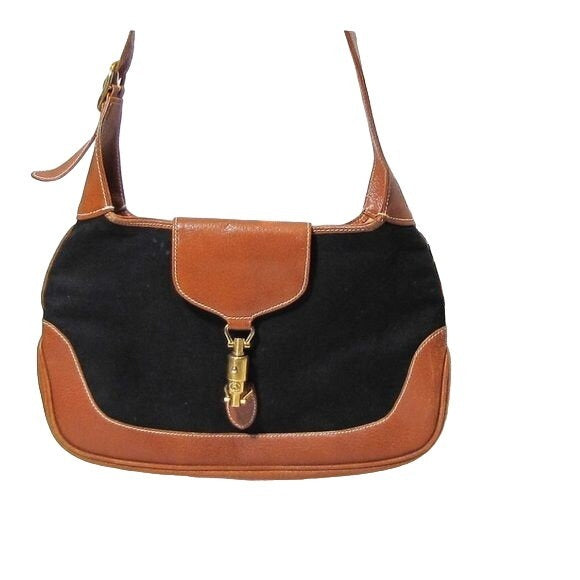 Original Gucci, 1961 Jackie hobo style shoulder bag, made in black linen canvas & camel leather with a gold piston closure & extender strap