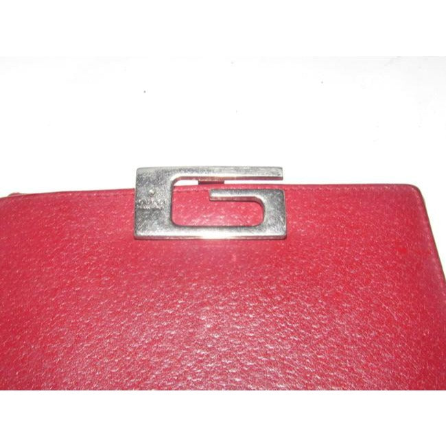 Gucci, true red leather, bi-fold, wallet with a change purse, gold G hinged closure, and lots of interior card slots