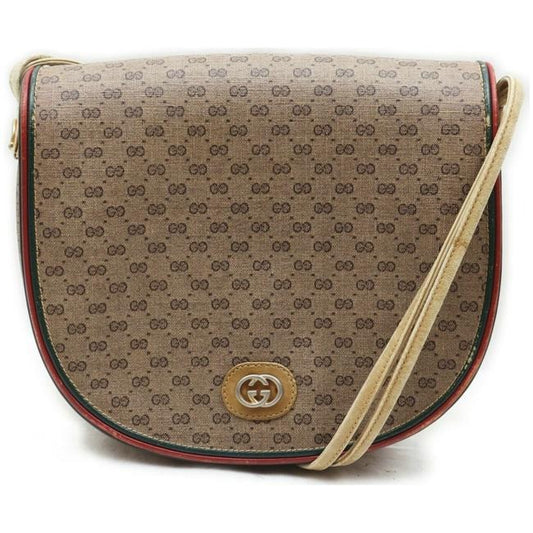 Gucci, rare, brown micro Guccissima print coated canvas/leather saddle bag with red and green inlaid leather stripes