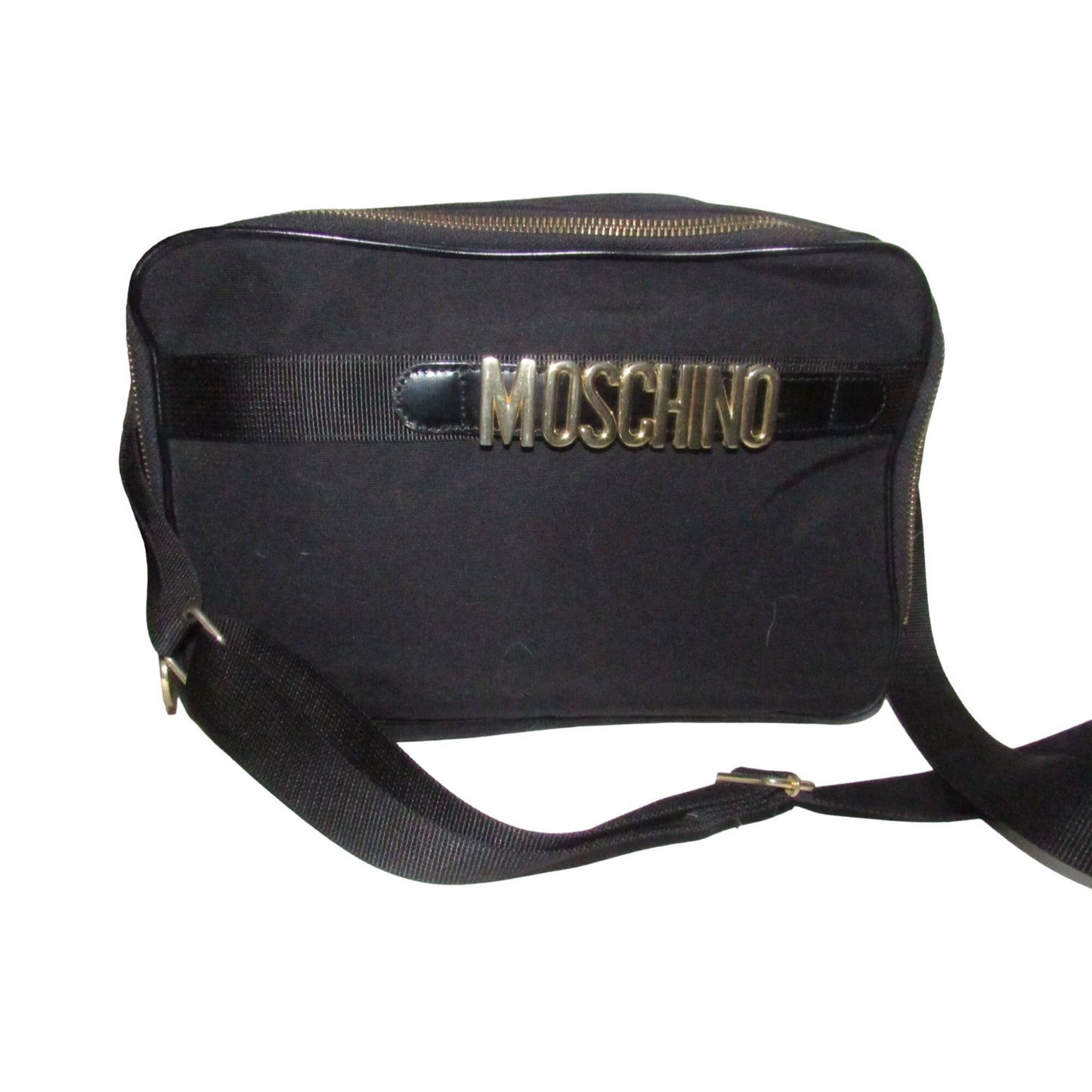 Moschino, black canvas & leather, cross body with a zip top, bold, gold, MOSCHINO letter accents, & a long strap with snaps on both sides