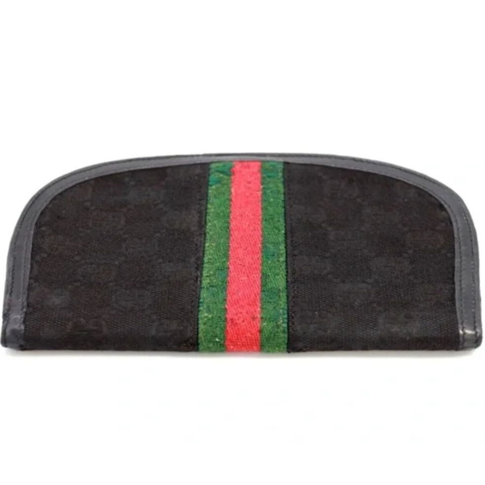 Rare, early Gucci, black Gucissima print canvas and black leather, semi-circular shape, wallet with an inlaid red and green Sherry stripe