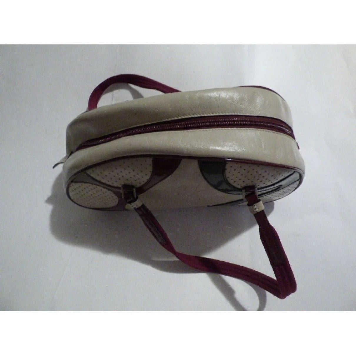 Vintage, 1990s Prada, light taupe leather and burgundy and black patent leather, satchel/ bowling bag style purse in a kidney shape