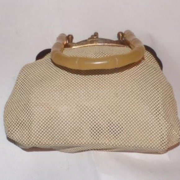 Art Deco, Whiting and Davis, cream enamel mesh purse with a carved bamboo look, translucent apple juice Bakelite handle