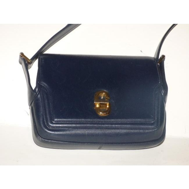 Gucci, RARE, bohemian/mod, navy blue leather, envelope top, shoulder purse with bold gold 'G' twist closure