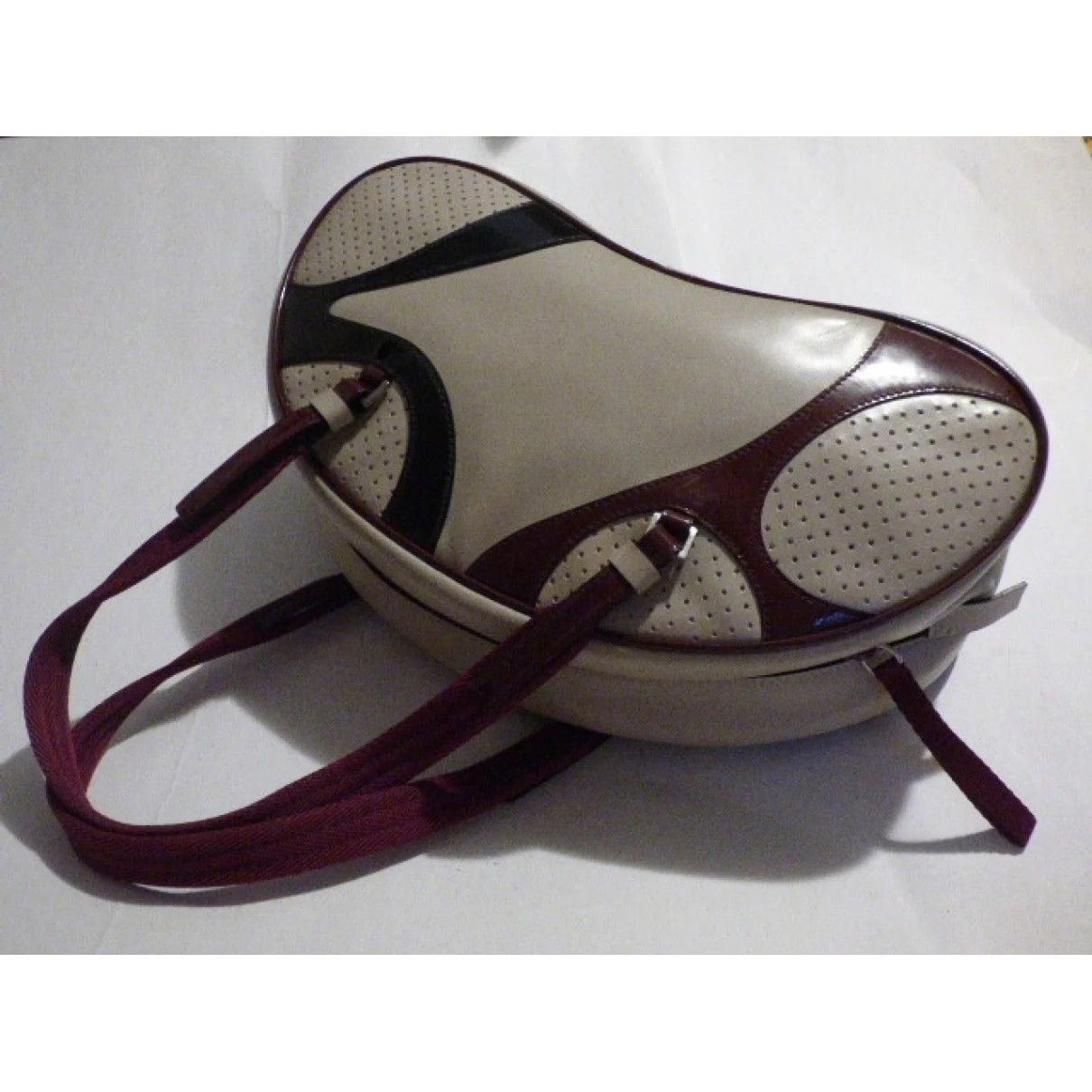 Vintage, 1990s Prada, light taupe leather and burgundy and black patent leather, satchel/ bowling bag style purse in a kidney shape