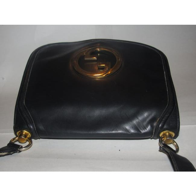 Vintage Gucci midnight blue leather 'Blondie' saddle style, shoulder bag with large, gold 'GG' emblem & multiple compartments