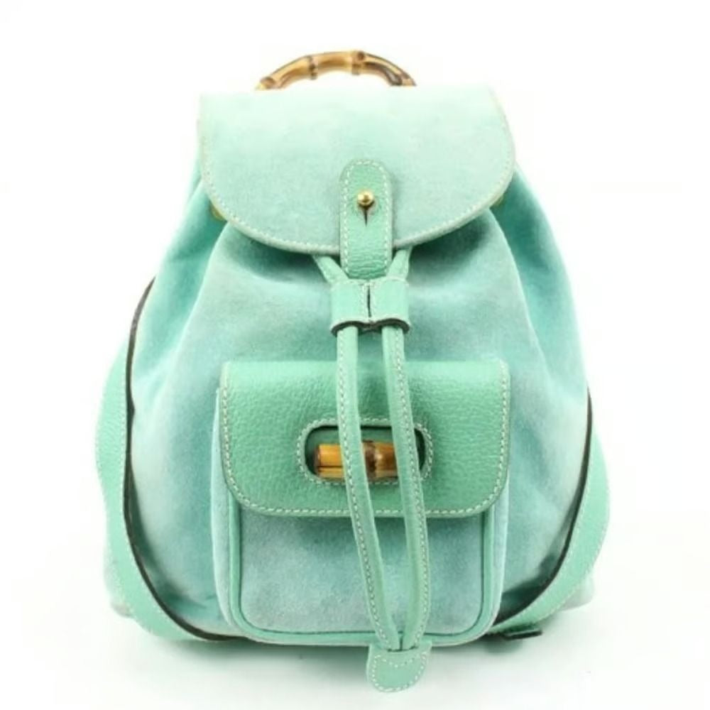 Tom Ford era, Gucci, aqua color, suede and leather, messenger bag/backpack with an exterior pocket, drawstring top closure