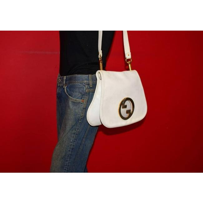 vintage, RARE, Gucci 'Blondie', supple white textured leather, saddle bag style, shoulder bag with large, gold 'GG' emblem