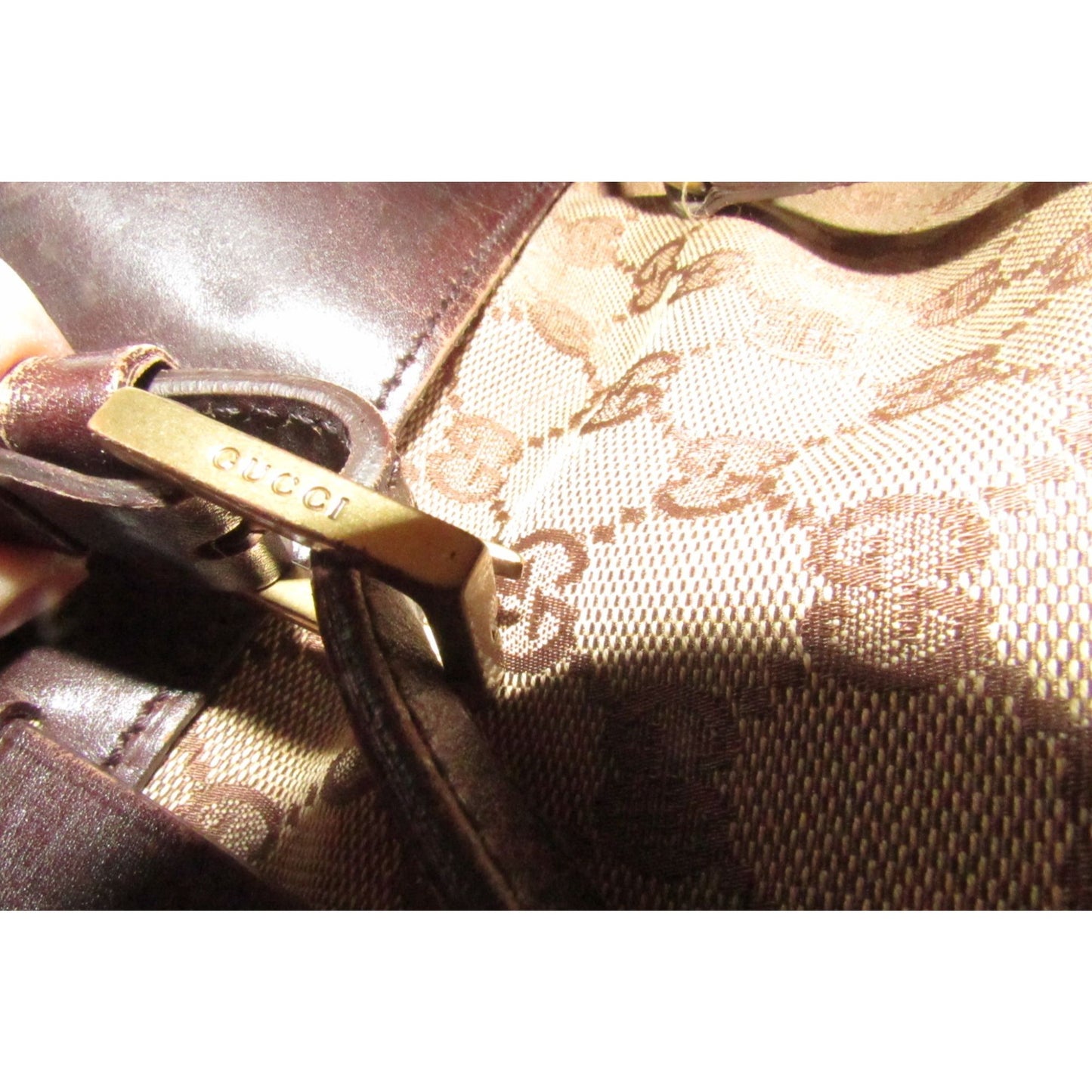 Gucci brown Guccissima print canvas & leather strappy cylindrical tote with brass accents