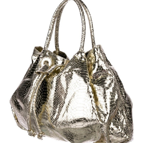 Metallic gold embossed leather Carlos Falchi Fatto A Mano satchel with silver-tone hardware & a removable strap