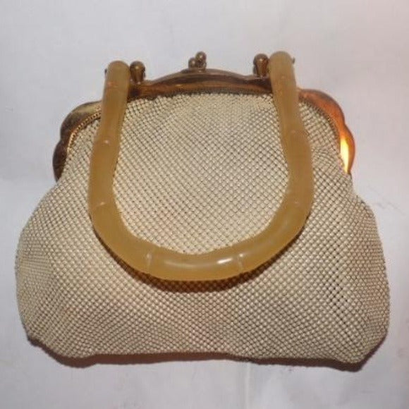 Art Deco, Whiting and Davis, cream enamel mesh purse with a carved bamboo look, translucent apple juice Bakelite handle