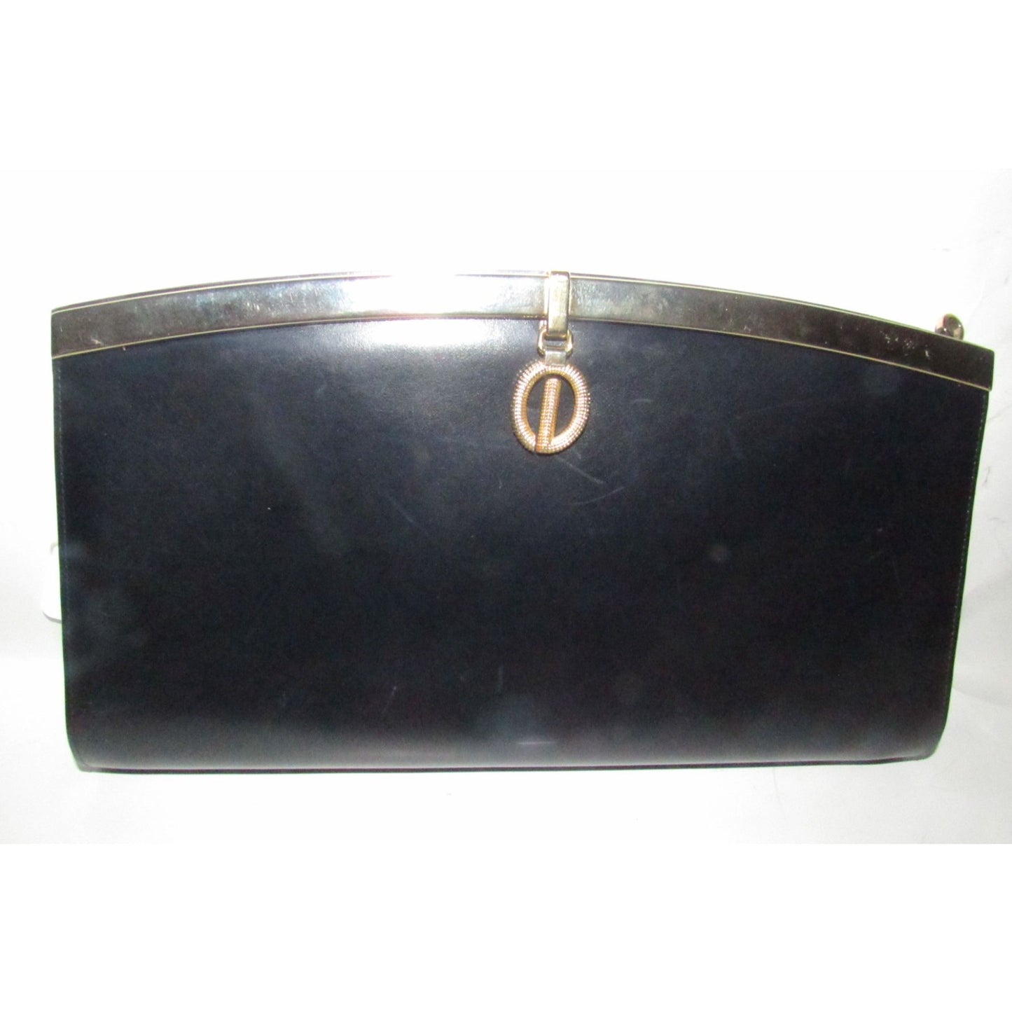 1960s mod, Dior, navy blue leather, two-way style with a hinged top with a latch snap closure, bold, gold Dior accents, & a removable strap