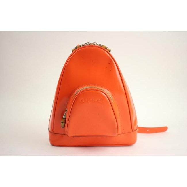 Tom Ford era, Gucci, petite, bright orange patent leather and smooth leather, triangular, messenger bag or backpack with a dual zip closure