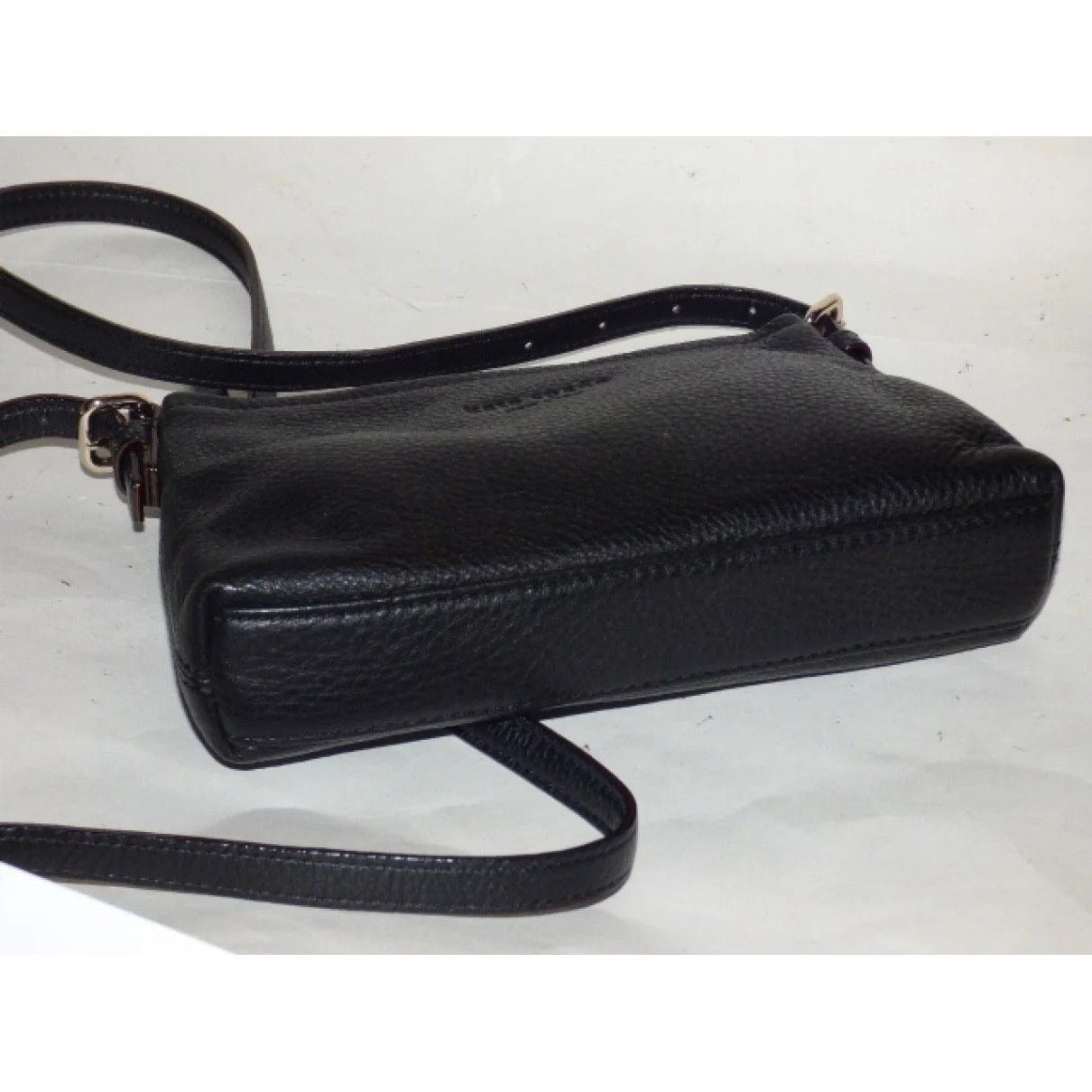 Kate Spade, classic, buttery soft black leather, rectangular, shoulder or cross body purse with top zip pocket and gold accents