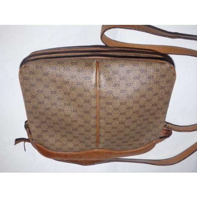 Gucci, brown micro Guccissima print coated canvas and camel leather cross body or shoulder bag with a zip top closure